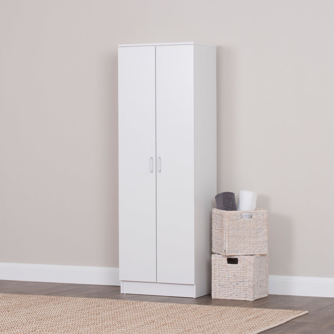 White cupboard with two pull-out drawers and a wicker basket on top